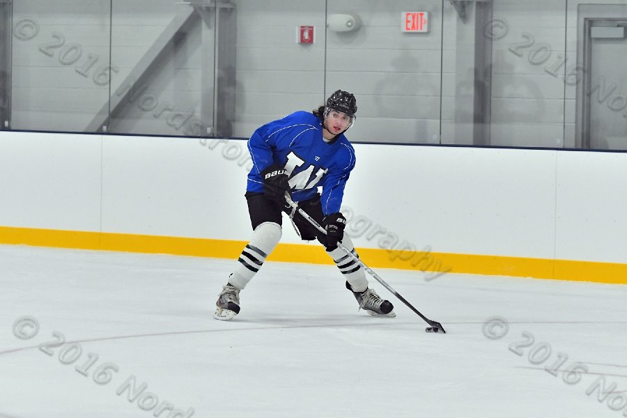 Wheaton College Men\'s Ice Hockey vs Middlesex Community College. - Photo By: KEITH NORDSTROM